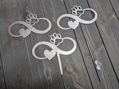 Examples of the variations of the Infiniti dog paw garden stake. options include the Infiniti dog paw metal sign without a stake, with a short stake, and with a longer welded stake. personalization options are also available.