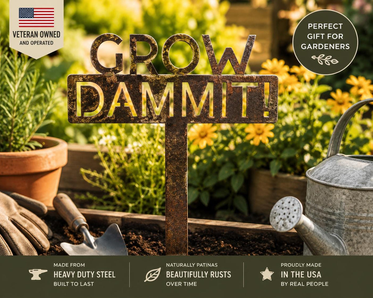 May include: A weathered metal garden stake with the words "GROW DAMMIT!" cut out. The stake is in a garden setting with a watering can, trowel, and potted plants. The sign is made in the USA.